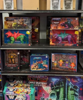Shelves of boxed vintage action figures stacked to the ceiling