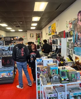 Shoppers browsing the aisles of figures, games and collectibles inside Zombie X Games